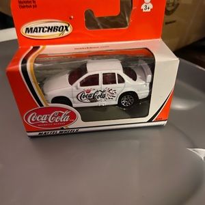 NIB white Coca Cola car matchbox car